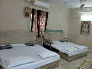 Postel nebo postele na pokoji v ubytování Stay Goa Guesthouse