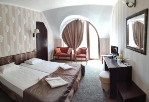 Postel nebo postele na pokoji v ubytování Guest House Palazzo