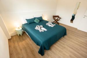 BORGOROMA - Business & Home tesisinde bir odada yatak veya yataklar