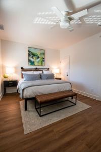 a bedroom with a large bed and a table at The Getaway Blowing Rock in Blowing Rock +46 photos