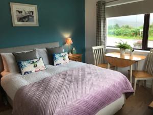Postel nebo postele na pokoji v ubytování Millview Ullapool