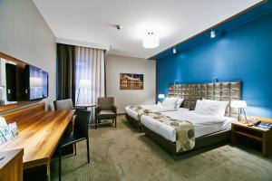 Krevet ili kreveti u jedinici u objektu Holiday Inn Krakow City Centre, an IHG Hotel