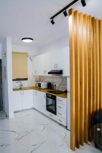 Kuchyň nebo kuchyňský kout v ubytování Sea Side Appartment in Kato Paphos