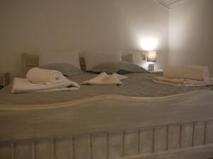 Posteľ alebo postele v izbe v ubytovaní Hotel Akropolis