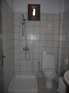 Kúpeľňa v ubytovaní Hotel Akropolis