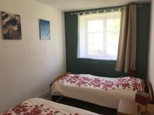 Postel nebo postele na pokoji v ubytování Gite de kermoel, Hoedic + 8 fotografií