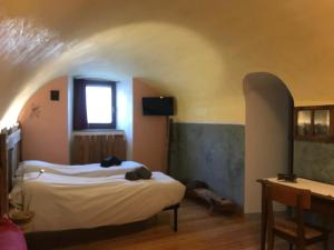 Postel nebo postele na pokoji v ubytování B&B da Erica