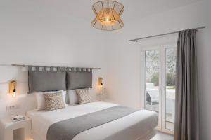 Postel nebo postele na pokoji v ubytování Sunray Lodgings