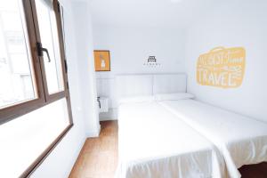 Posteľ alebo postele v izbe v ubytovaní Hostal Misericordia