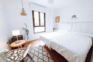 Posteľ alebo postele v izbe v ubytovaní Hostal Misericordia
