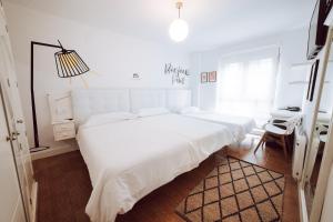 Posteľ alebo postele v izbe v ubytovaní Hostal Misericordia