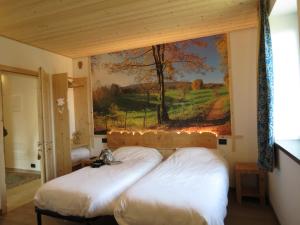Postel nebo postele na pokoji v ubytování B&B da Erica