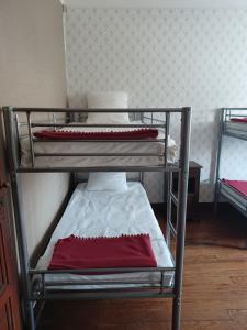 a bedroom with a bed and a desk at Gite Compostella in Saint-Jean-Pied-de-Port