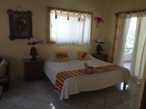 Letto o letti in una camera di Hacienda Jaqueline