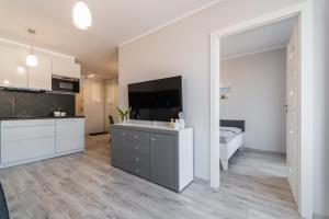 Kuchnia lub aneks kuchenny w obiekcie Apartament Baltic Sun N°37