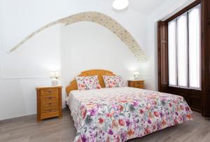Postel nebo postele na pokoji v ubytování Casa Verònica