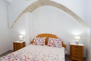 Postel nebo postele na pokoji v ubytování Casa Verònica