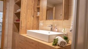 Ένα μπάνιο στο StuWip alps Appartement Sonnenstein