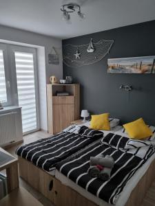 Postel nebo postele na pokoji v ubytování Willa Andrus