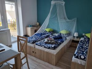 Postel nebo postele na pokoji v ubytování Willa Andrus