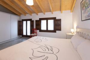 Postel nebo postele na pokoji v ubytování Casa Verònica