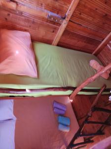 an overhead view of a bunk bed in a room at Luna treehouse in Preveza