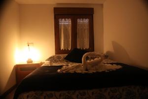 A bed or beds in a room at Casita La Glorieta