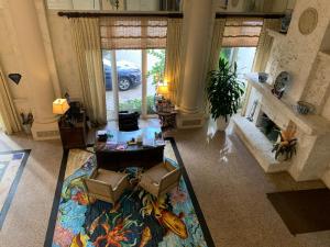 an aerial view of a living room with a fireplace at The Lago Mar Beach Resort and Club in Fort Lauderdale
