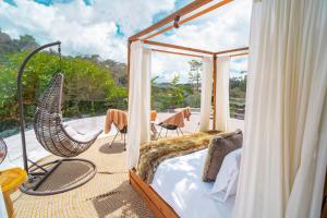Ein Balkon oder eine Terrasse in der Unterkunft BubbleSky Glamping Guatapé