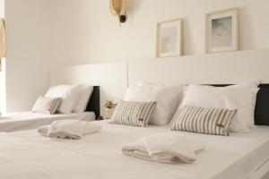 Кровать или кровати в номере Blue Island Luxury Hotel Adults Only
