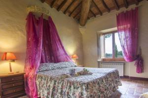 Letto o letti in una camera di Agri-tourism Il Castelletto Torrita di Siena - ITO10016-CYA
