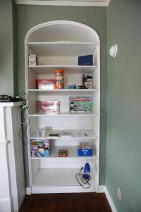 an open refrigerator door with shelves in a room at Blue House, Blocks from Ross-Aide, Mackey, Samara House, Birck Golf Complex in West Lafayette