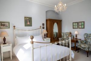 Ліжко або ліжка в номері Newgate House