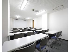 an empty classroom with white tables and chairs at Tokyo Inn - Vacation STAY 10249v in Tokyo