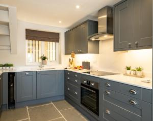 Køkken eller tekøkken på Mino Cottage