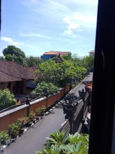 a view of a street with trees and plants at A&B Homestay and Kitchen in Nusa Dua
