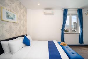Postel nebo postele na pokoji v ubytování Alibaba Hotel by THG
