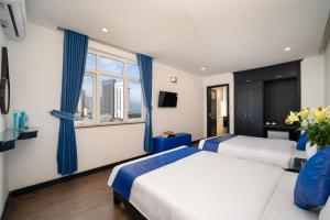 Postel nebo postele na pokoji v ubytování Alibaba Hotel by THG