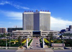 a tall building with people on top of it at Holiday Inn Express Yingkou Onelong Plaza by IHG in Gaizhou