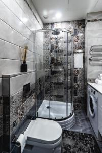 Koupelna v ubytování Familia Apartments + 57 fotografií