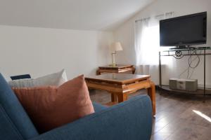TV a/nebo společenská místnost v ubytování Wohnung Steuerbord