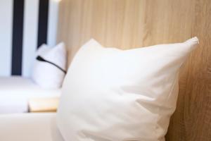 ACHAT Hotel Stuttgart Zuffenhausen 객실 침대