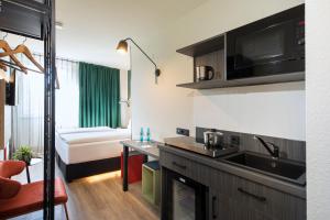 ACHAT Hotel Stuttgart Zuffenhausen 주방 또는 간이 주방