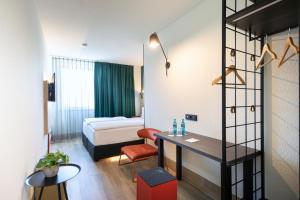 ACHAT Hotel Stuttgart Zuffenhausen 객실 침대