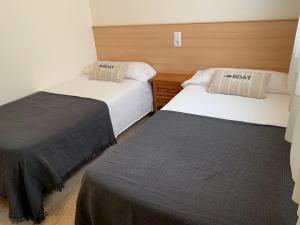 Postel nebo postele na pokoji v ubytování Apartaments Flamingo