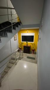 TV a/nebo společenská místnost v ubytování Hidden Gem Residency + 37 fotografií