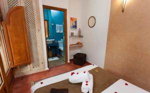 Vuode tai vuoteita majoituspaikassa Riad l'Heure d'Eté