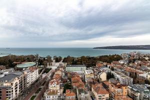 an aerial view of a city with the ocean at Hotel & Casino Cherno More in Varna City