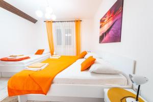 Katil atau katil-katil dalam bilik di Apartments Jadran
