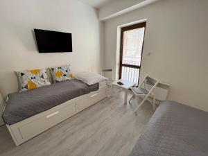 Postel nebo postele na pokoji v ubytování Garni pension U svatého Urbana